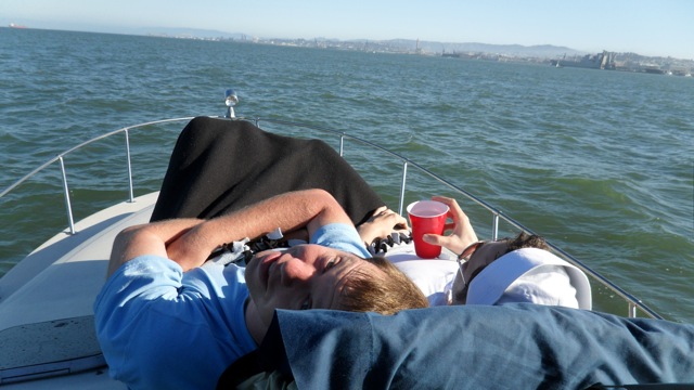 Rob and Eric lounging on the front of the boat