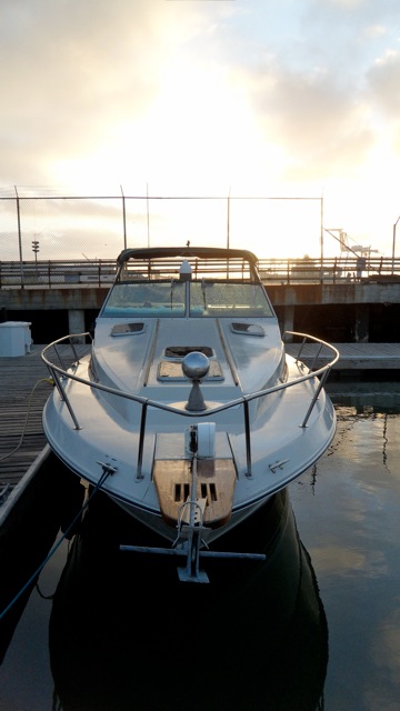 Docked at Mariner Square with the sun setting behind