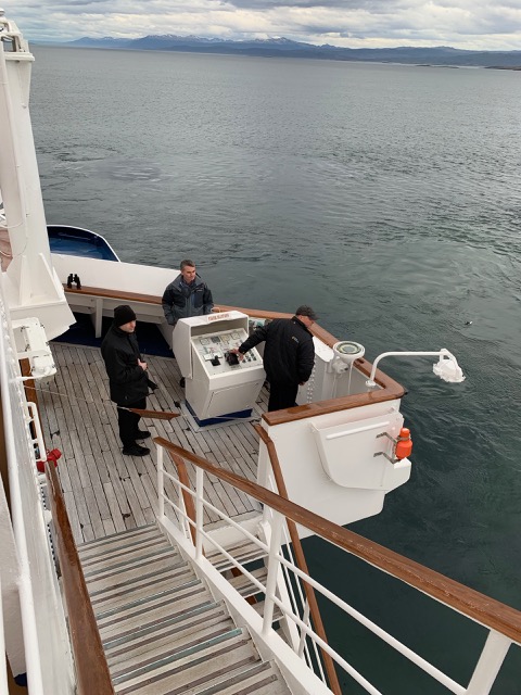 Captain backing up the ship while the Pilot watches