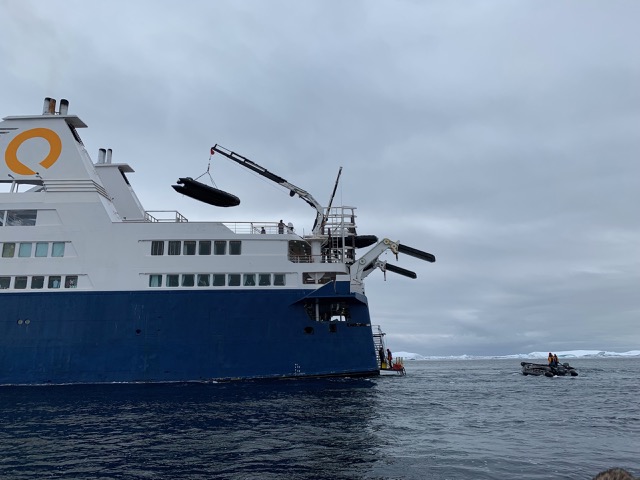 Loading Zodiacs back onto the ship