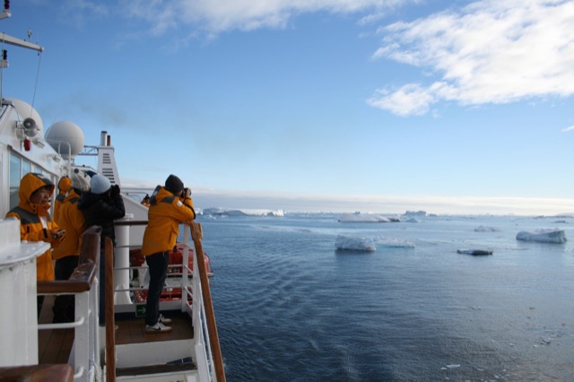 Taking photos of the ice from the ship