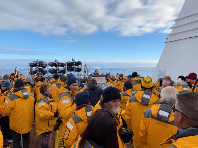 Everyone gathers on deck to cross the Circle