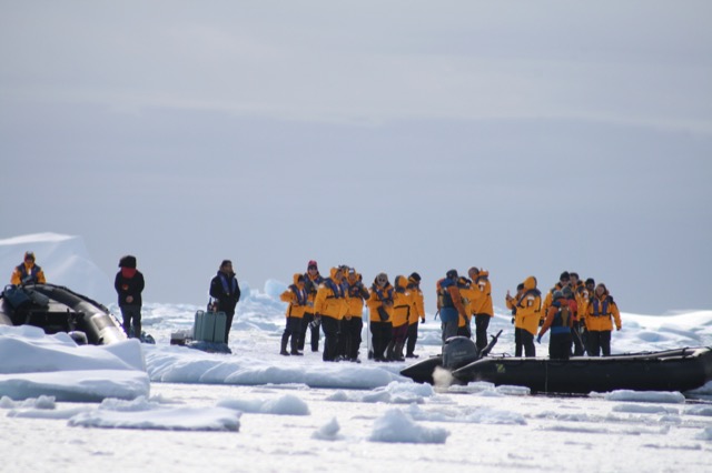 Standing on the sea ice, where they've set up a make-shift bar