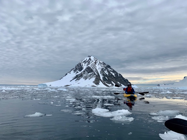 Paddling in inflatable kayaks with this as our scenery