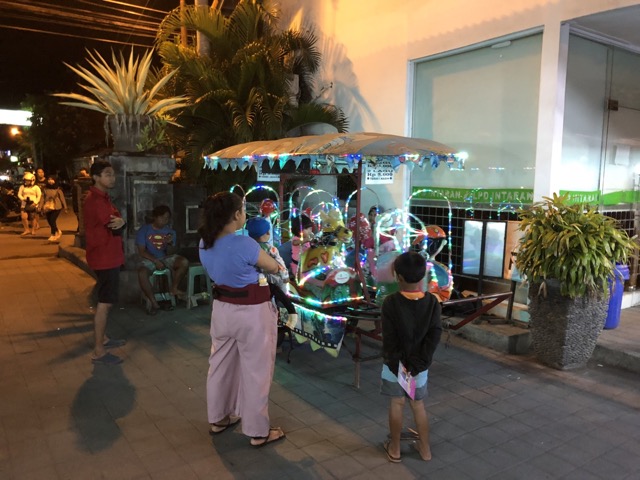 Kids ride at the night market