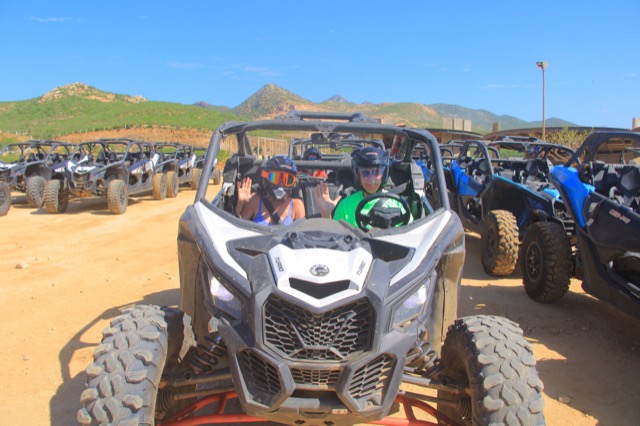 Mom and Dad in their Can-Am X3 UTV