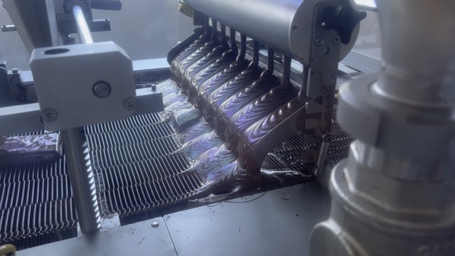 Enrobing with more chocolate