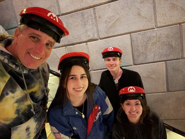 Myke, Aly, Harris, and Reiley, ready to ride Mario Kart