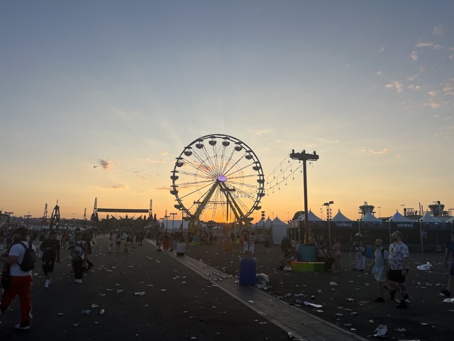 Heading out as the sun rises behind the Ferris Wheel