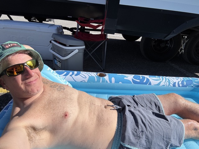 Relaxing in my own little kiddie pool at camp