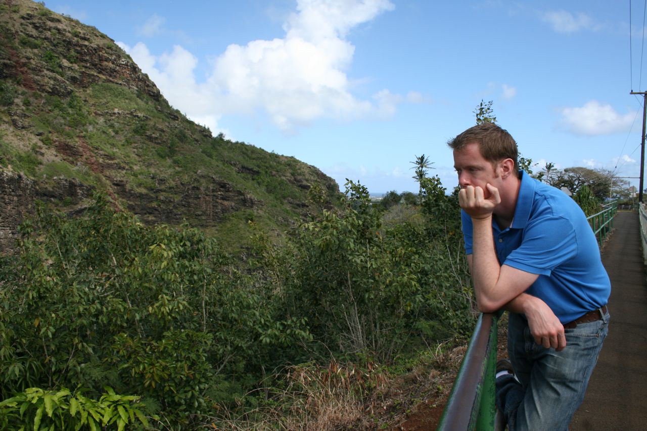 Rob leaning on fence