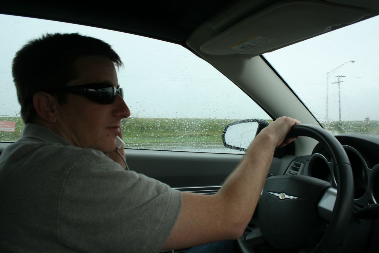 Myke driving and talking on the phone