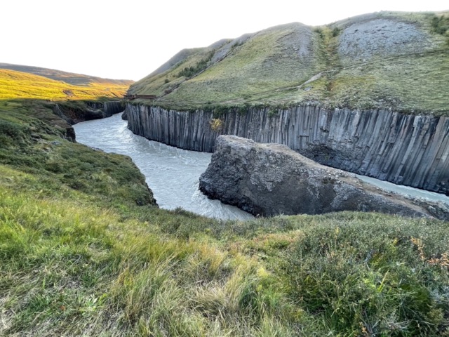 Stuðlagil Canyon where you can see the stairs and observation platform from the other side