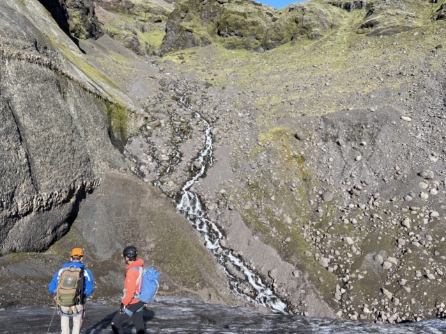 Hiking down towards the ice cave which was created by this stream