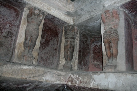 Statues in the wall of the warm room. The cubbies were used to hold ointments and other trinkets