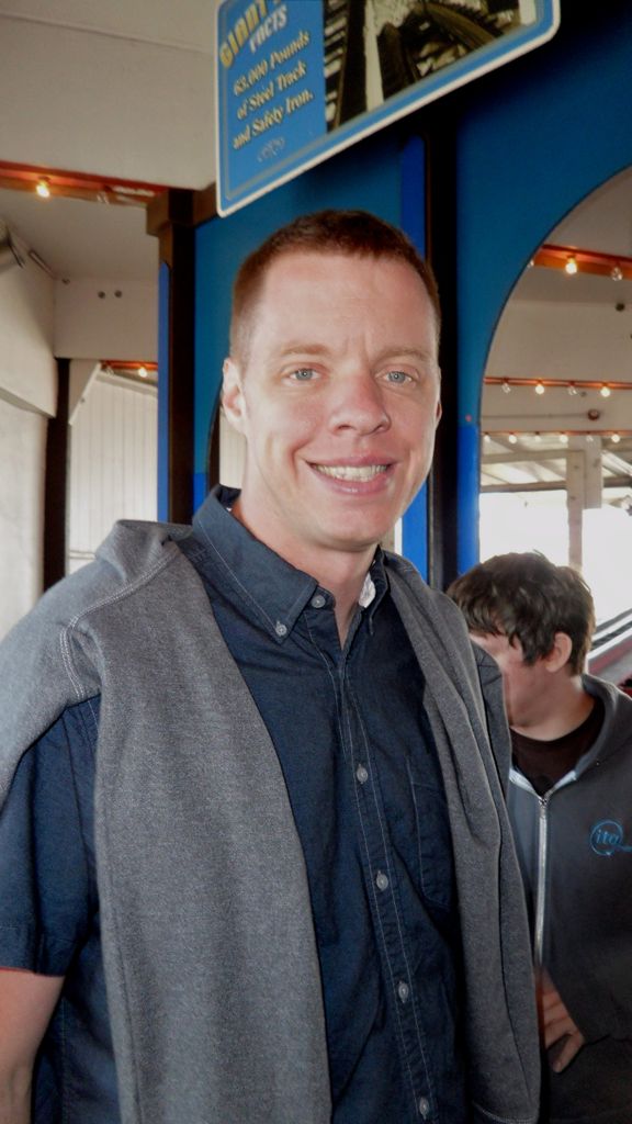 Rob in line for the roller coaster
