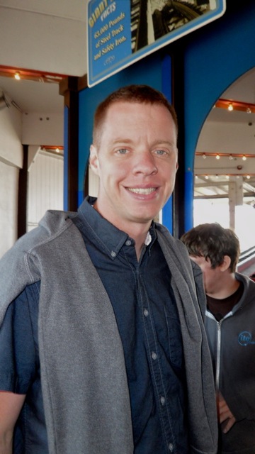 Rob in line for the roller coaster