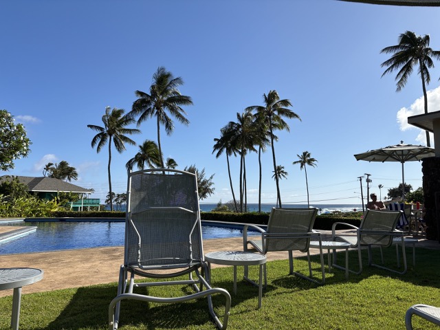 Relaxing by the pool at our resort