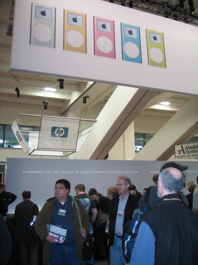 iPod mini banner and the stations at the front of the booth where I was working