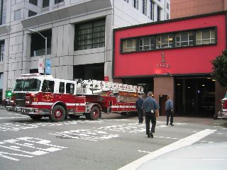 Outside now -- A SFFD truck backs up into the station.  Notice the green light on the right side of the truck...kinda like a boat!