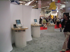 JBL Booth with syncronized music videos on each iMac