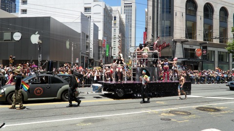 Military bug pulling a float