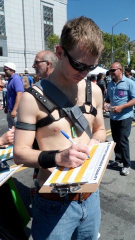 Brian signing up for marriage equality at the HRC booth