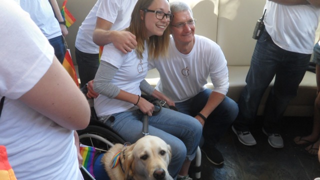 Tim with a woman and her guide dog