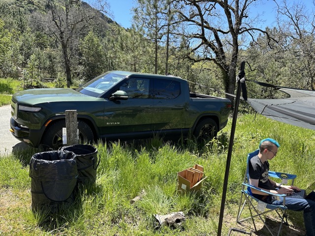 Camping next to the Rivian
