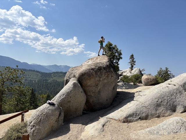 Geno on the top of a boulder