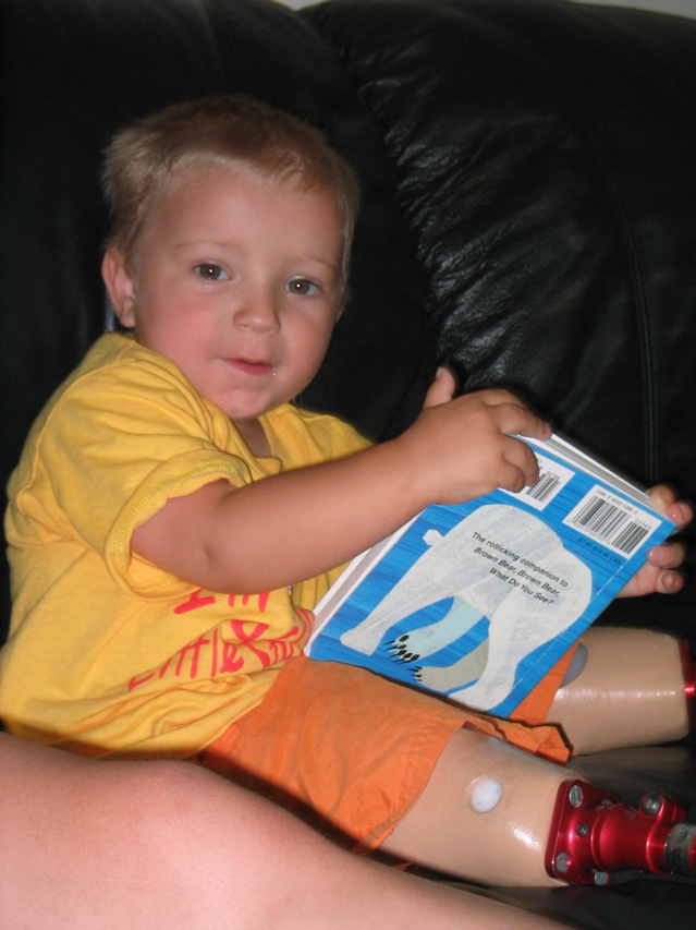 Theo reading on the couch