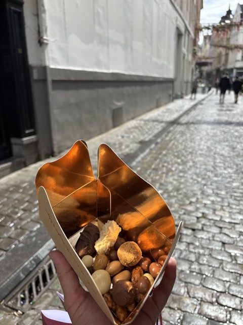 Eating Belgian chocolate while walking around