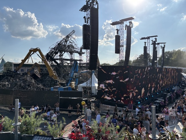 ...with the remnants of the burned down old stage still behind it