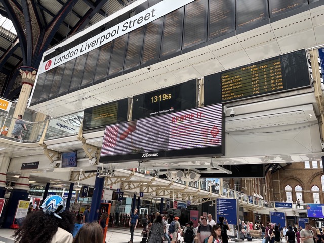 London Liverpool Street train station with a Kewpie ad