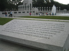 Here in the presence of Washington and Lincoln...